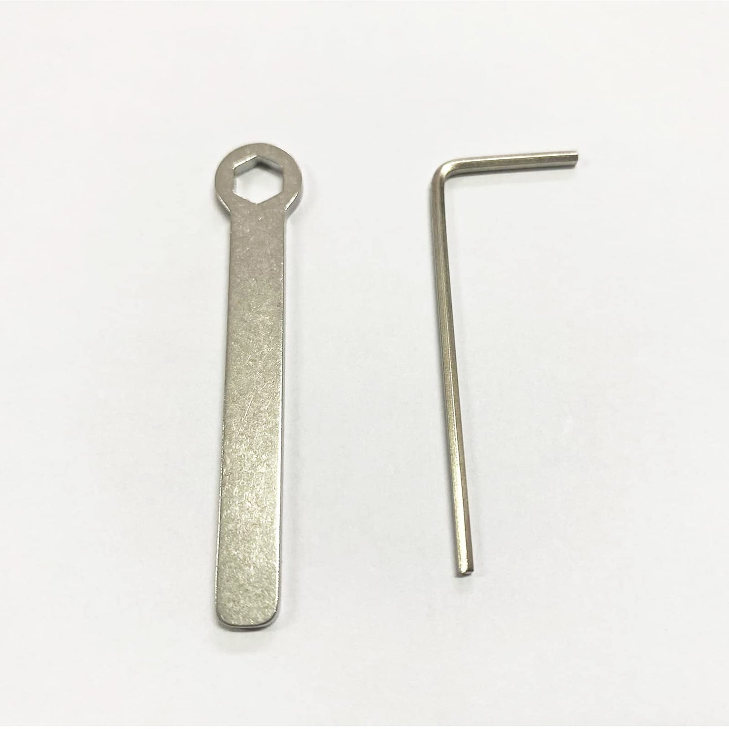 CW Keyer Wrench and Allen set, featuring a 5.5mm wrench and a 1.5mm hex key. Crafted from durable metal.